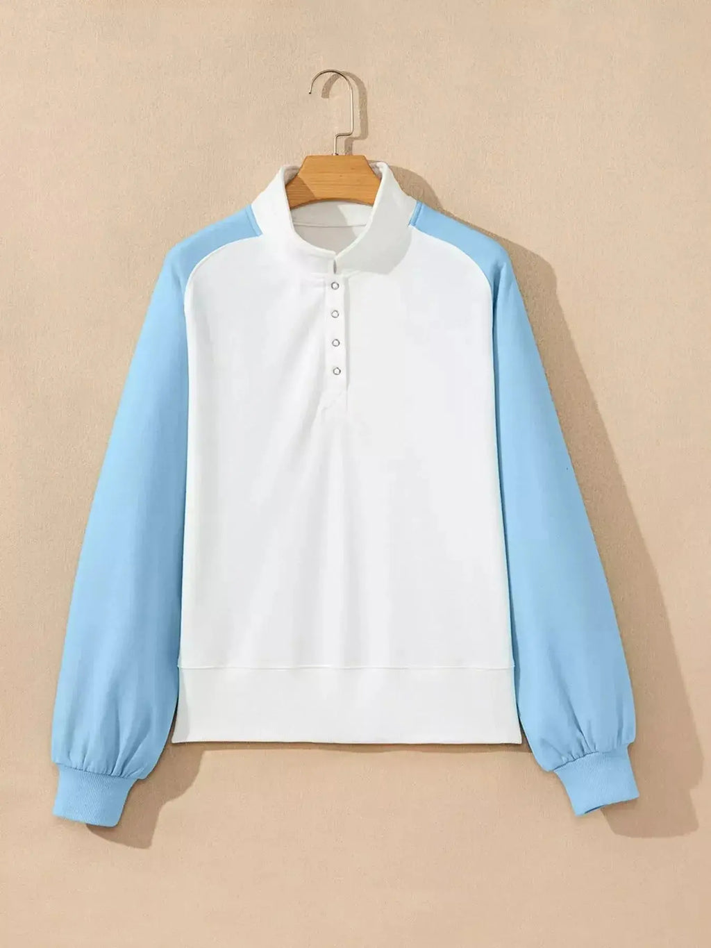 Women's color block snap button sweatshirt by Plush Fashion Hub, soft cotton blend pullover with vibrant color blocking and casual fit.