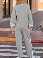 Plush Fashion Hub contrast trim round neck lounge set with cozy two-piece top and matching pants, casual and comfortable outfit.