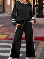 Plush Fashion Hub contrast trim round neck lounge set with cozy two-piece top and matching pants, casual and comfortable attire.