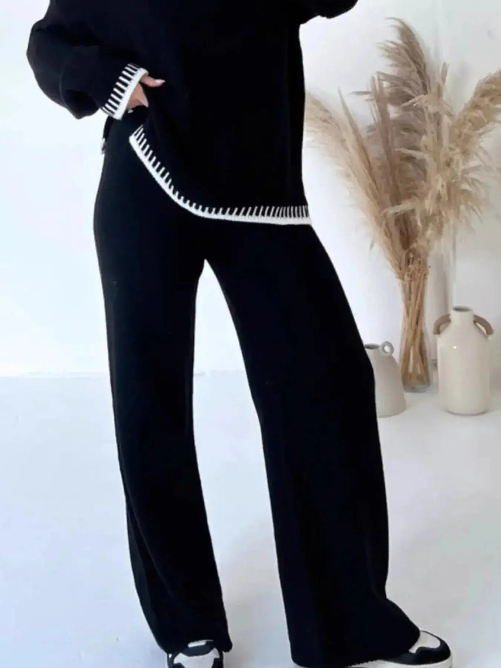 Contrast trim round neck sweater top and wide-leg pants lounge set by Trendsi, featuring cozy knit fabric and stylish relaxed fit.