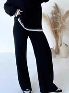 Contrast trim round neck sweater top and wide-leg pants lounge set by Trendsi, featuring cozy knit fabric and stylish relaxed fit.