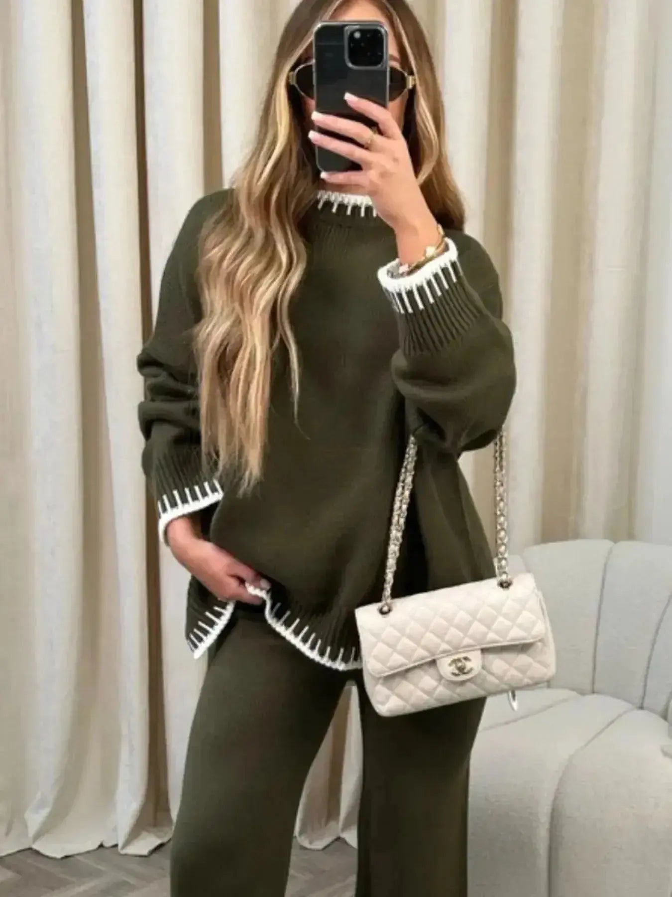 Contrast trim round neck sweater top and wide-leg pants lounge set by Trendsi, featuring cozy knit fabric and stylish design.