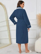 Trendsi plush tie waist lounge nightgown with contrast trim and pockets, cozy pajamas for relaxed comfort.