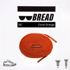 Coral orange elastic shoelace from Plush Fashion Hub, showing its flexible, vibrant design suitable for casual footwear.