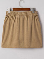 Women's high-waisted corduroy mini skirt with button-front closure, stylish and fitted from Plush Fashion Hub.