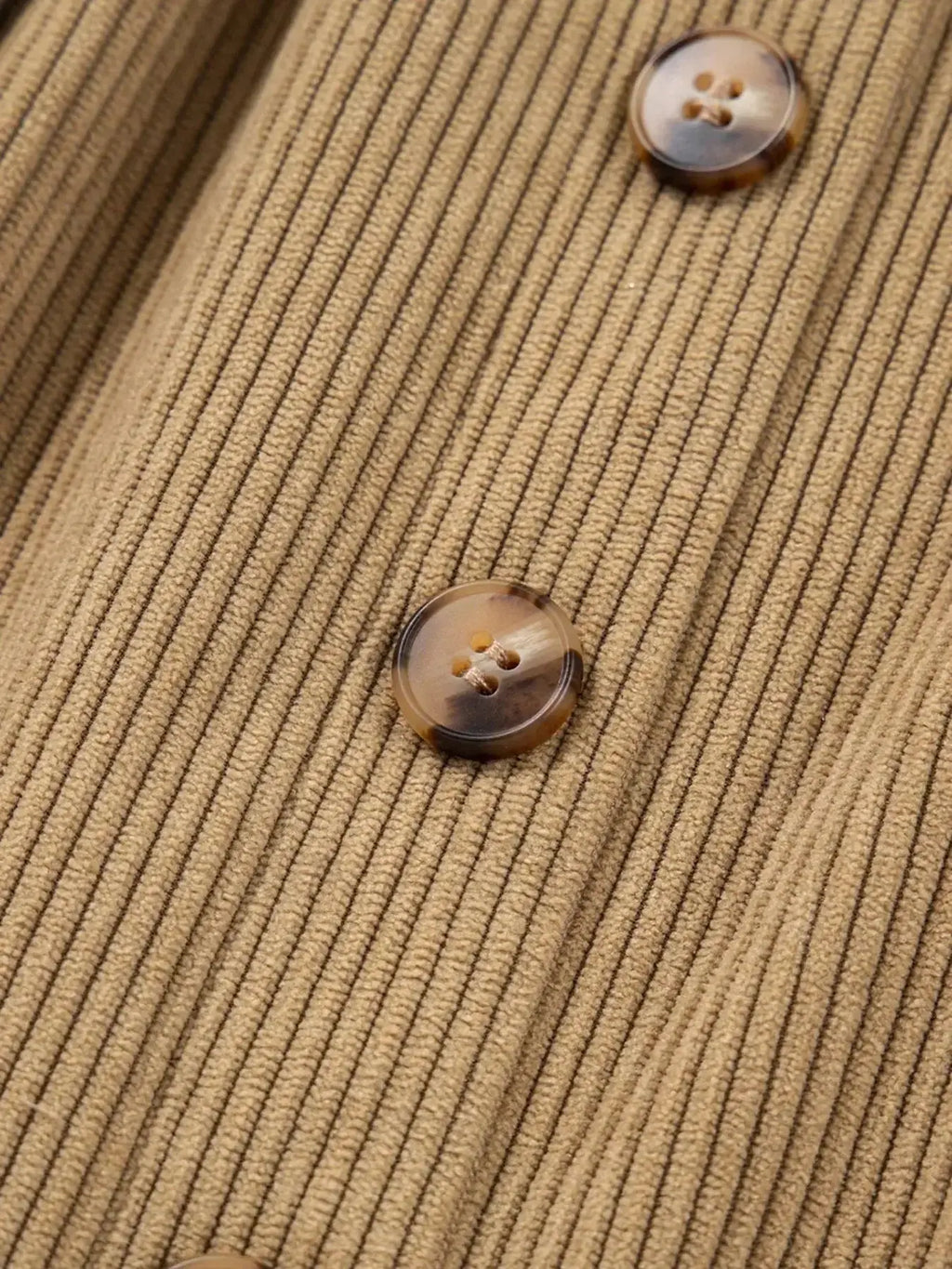 Women's high-waisted corduroy mini skirt with front buttons, stylish and fitted from Plush Fashion Hub.