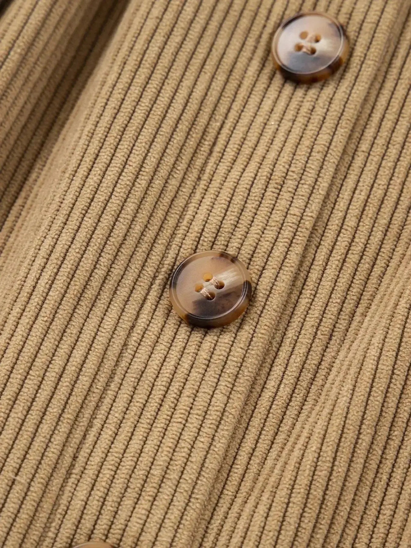 Women's high-waisted corduroy mini skirt with front buttons, stylish and fitted from Plush Fashion Hub.
