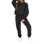 Fleece-lined women's crew neck sweatshirt and sweatpants loungewear set by Plush Fashion Hub, casual cozy two-piece outfit.