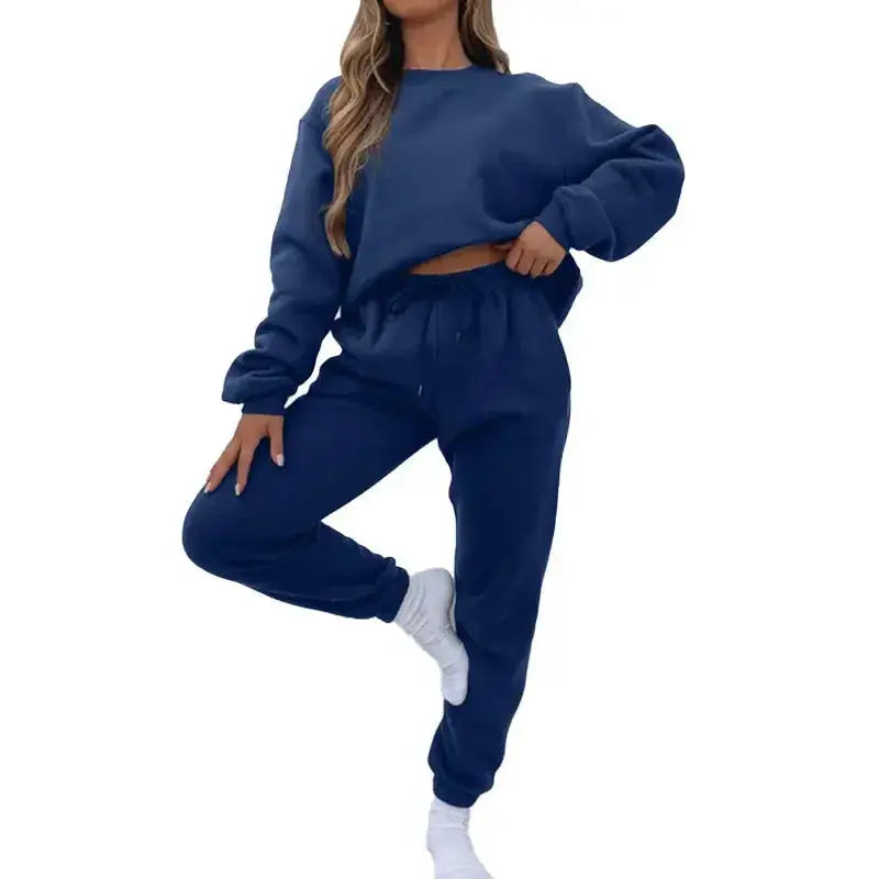 Fleece-lined women's crew neck sweatshirt and matching sweatpants loungewear set by Plush Fashion Hub, casual and cozy.