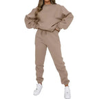 Plush Fashion Hub women's fleece-lined crew neck sweatshirt and matching sweatpants loungewear set, casual and cozy for relaxation.