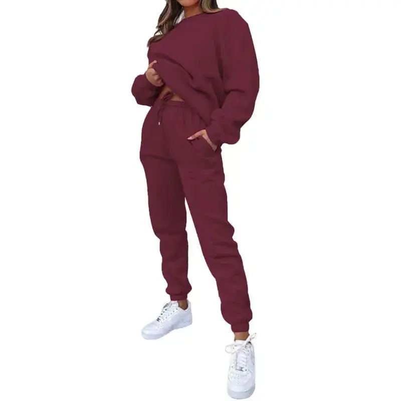 Plush Fashion Hub women's fleece-lined crew neck sweatshirt and matching sweatpants loungewear set, casual and cozy for relaxed wear.