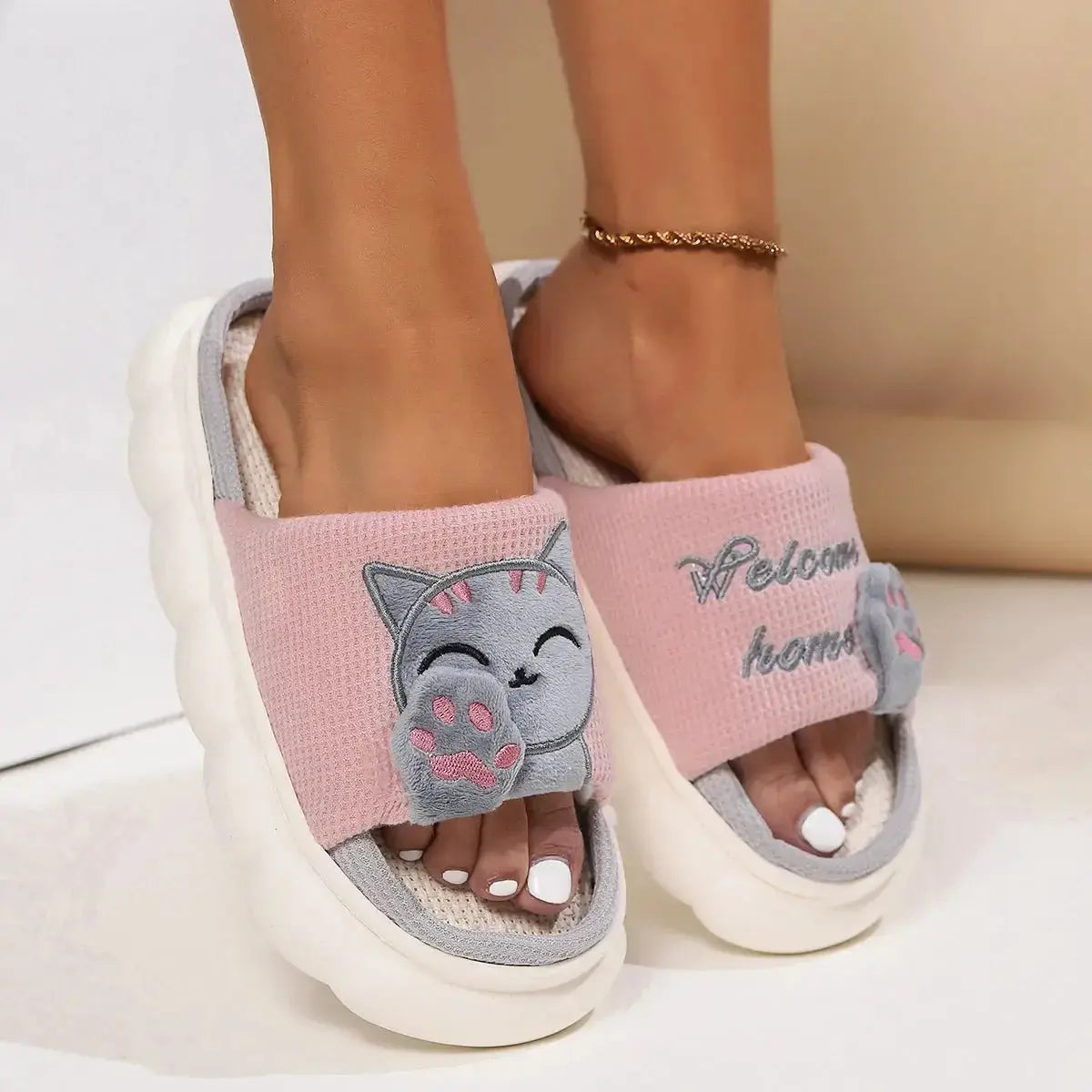 Cute cartoon kitten plush slippers for women from Plush Fashion Hub, soft indoor footwear with adorable kitten design.