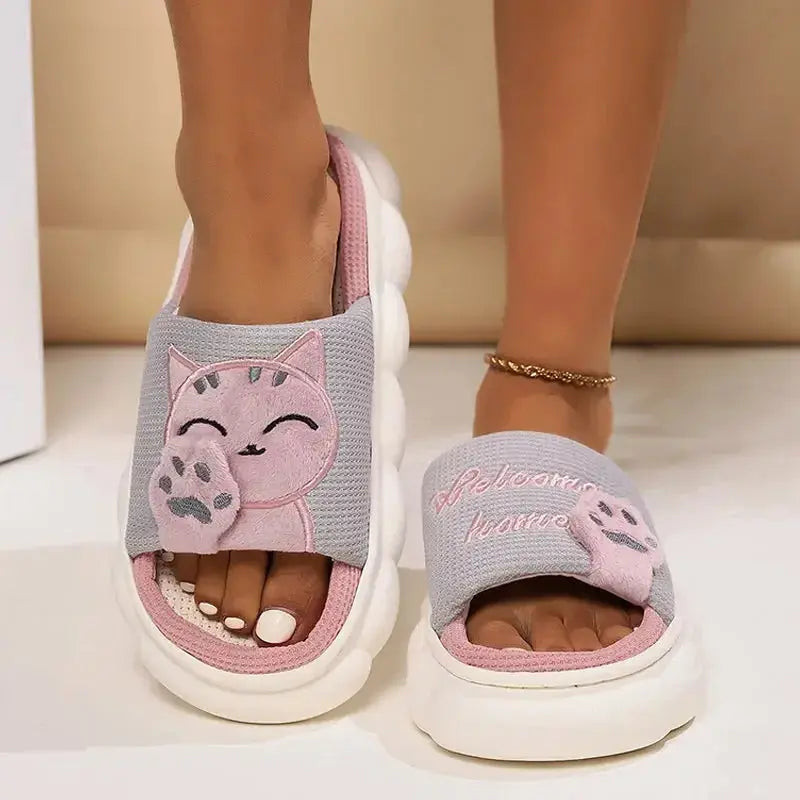 Cute cartoon kitten plush slippers for women by Plush Fashion Hub, soft indoor footwear with adorable kitten design.
