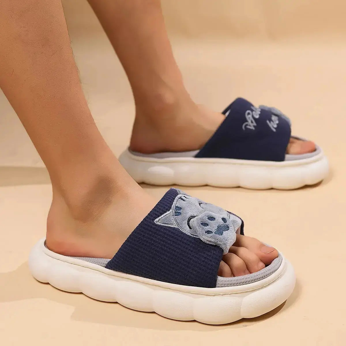 Cute cartoon kitten plush slippers for women by Plush Fashion Hub, soft indoor footwear with cozy, plush design and adorable kitten face.