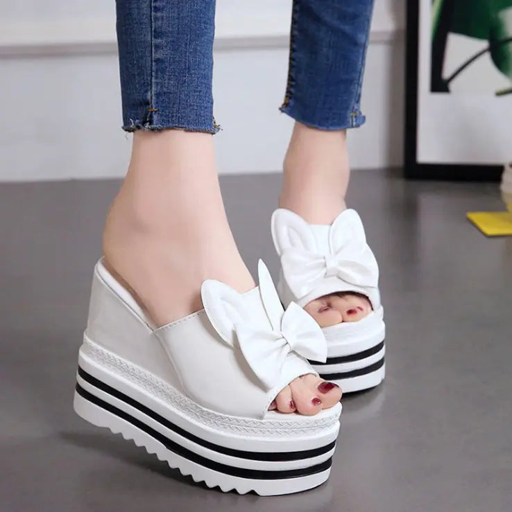 Women's waterproof wedge platform sandals with high heels, featuring stylish straps and a comfortable design.