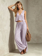 Women's V-neck sleeveless camisole top and wide-leg pants set by FitiqueFit, stylish matching loungewear ensemble.
