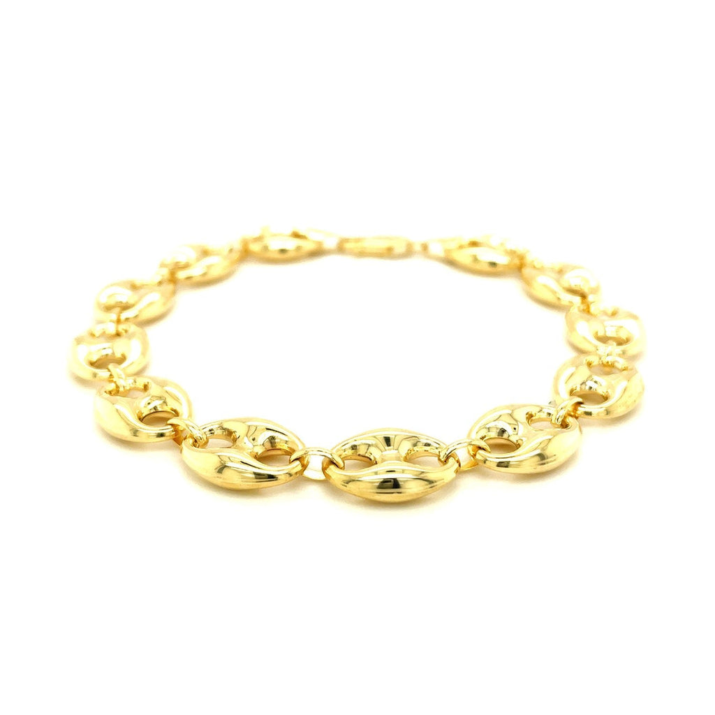 Gold puffed Mariner link bracelet in 14k yellow gold, featuring a polished, textured design, perfect for elegant jewelry collection.