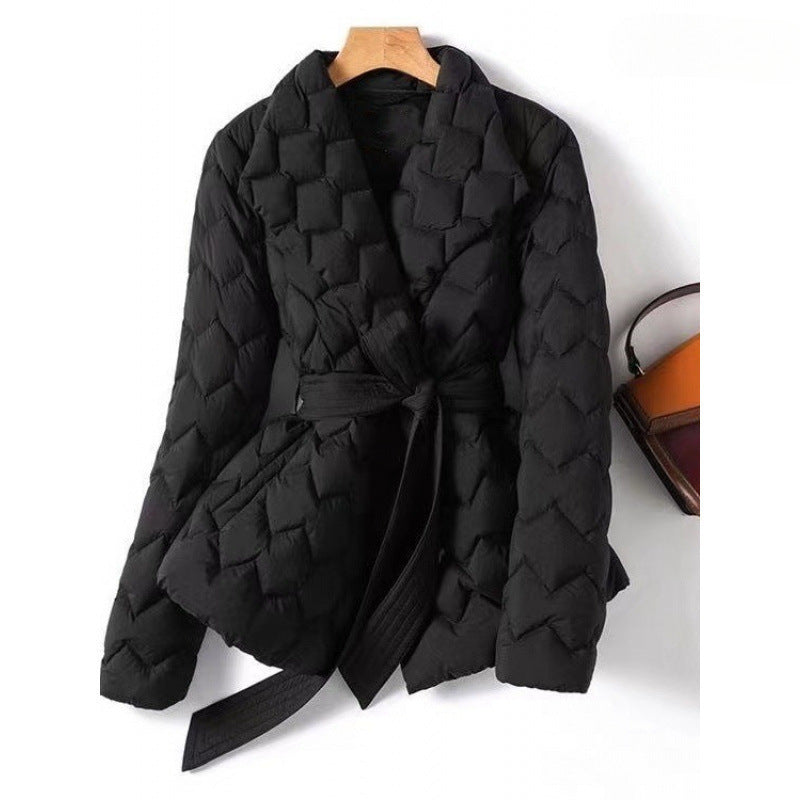 Black quilted nylon puffer jacket with a shawl collar, tie belt, and checkered pattern.