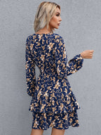 Floral layered surplice balloon sleeve dress by Plush Fashion Hub, casualwear with a floral print and elegant design.