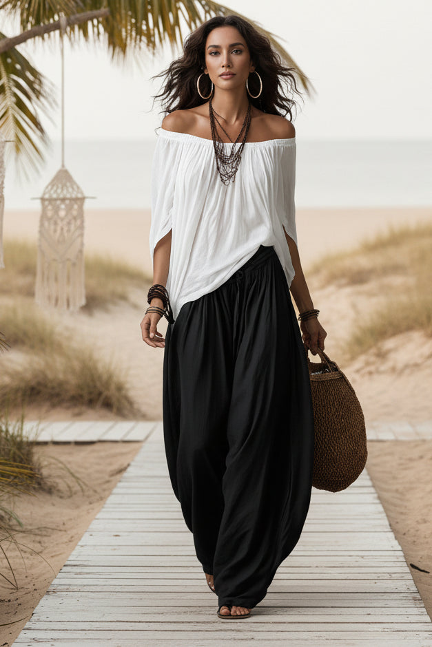 Women's one-shoulder T-shirt and wide-leg pants two-piece set by FitiqueFit, casual urban outfit, shown in a stylish streetwear look.