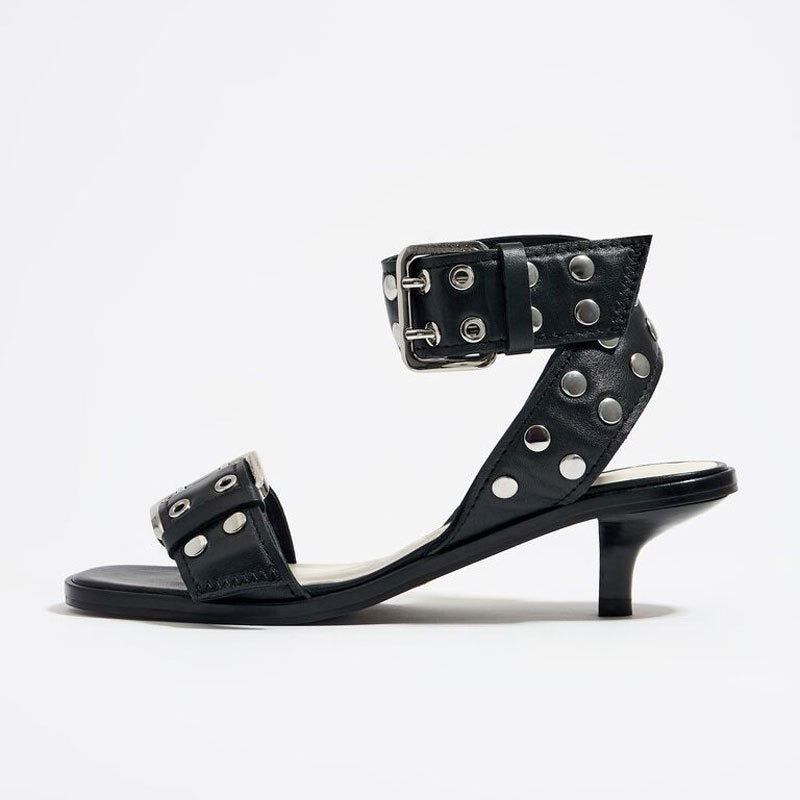 Eprolo rivet accent mid-heel strappy sandals with open toe and ankle straps, featuring fashionable rivet details.