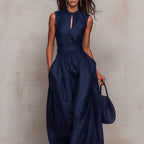 Women's navy blue striped sleeveless wide-leg jumpsuit by FitiqueFit, featuring a high-waist French style design.
