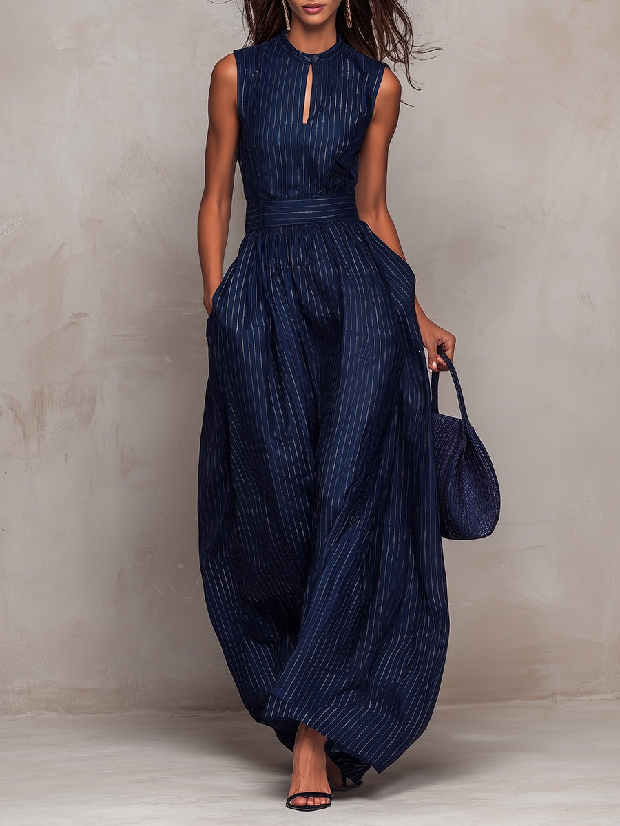 Women's navy blue striped sleeveless jumpsuit with high waist and wide-leg design by FitiqueFit, French style fashion.