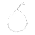 14k white gold adjustable friendship bracelet with pearls, featuring elegant design and delicate craftsmanship.