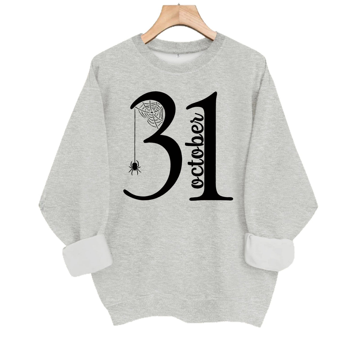 Grey crewneck sweatshirt in a knit fabric, featuring large black text reading "31 October" with a spider web and spider.