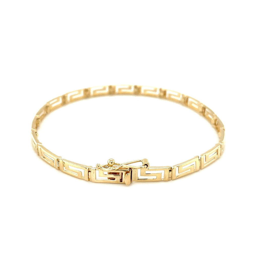 14k yellow gold Greek fret design bracelet with intricate pattern, showcasing a luxurious and elegant jewelry piece.