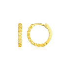 14k yellow gold petite textured round hoop earrings with a sleek finish, designed for a stylish and elegant look.