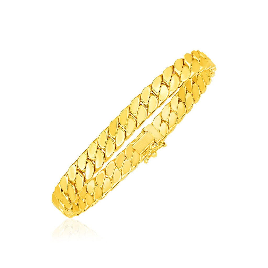 14k yellow gold men's 8-inch curb chain bracelet with polished links, stylish jewelry accessory.