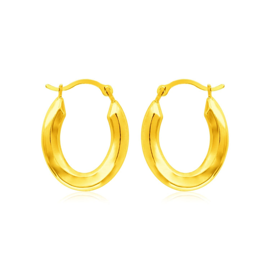 Polished 14k yellow gold oval hoop earrings with a smooth finish, crafted for elegant wear.