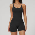Women's sleeveless slim-fit backless jumpsuit by FitiqueFit featuring sporty fashion style, shown on a model with a fitted silhouette.