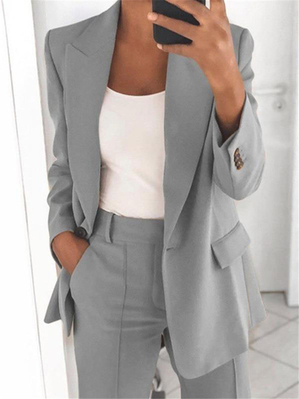 Sophisticated Plush Fashion Hub slim fit blazer with notched collar, tailored outerwear for a sleek, stylish look.