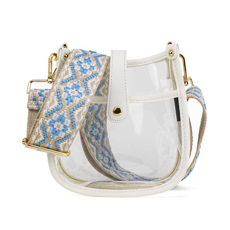 Clear compact courier bag by Threaded Pear with adjustable strap, featuring a transparent design and bag closure, perfect for versatile use.
