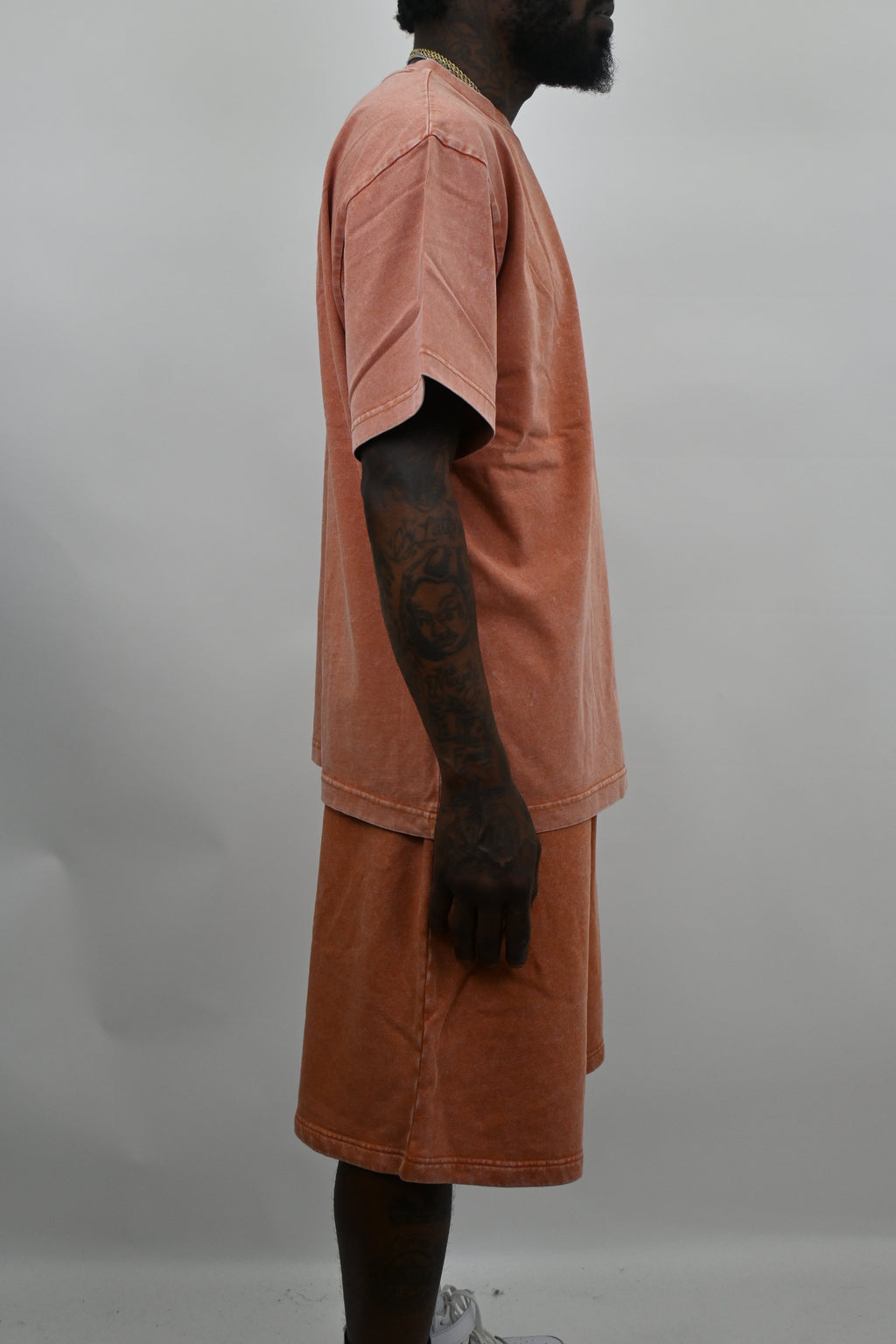 Stone washed sets from ARMOR JEANS, featuring casual clothing with a relaxed, trendy look, displayed on a flat surface.