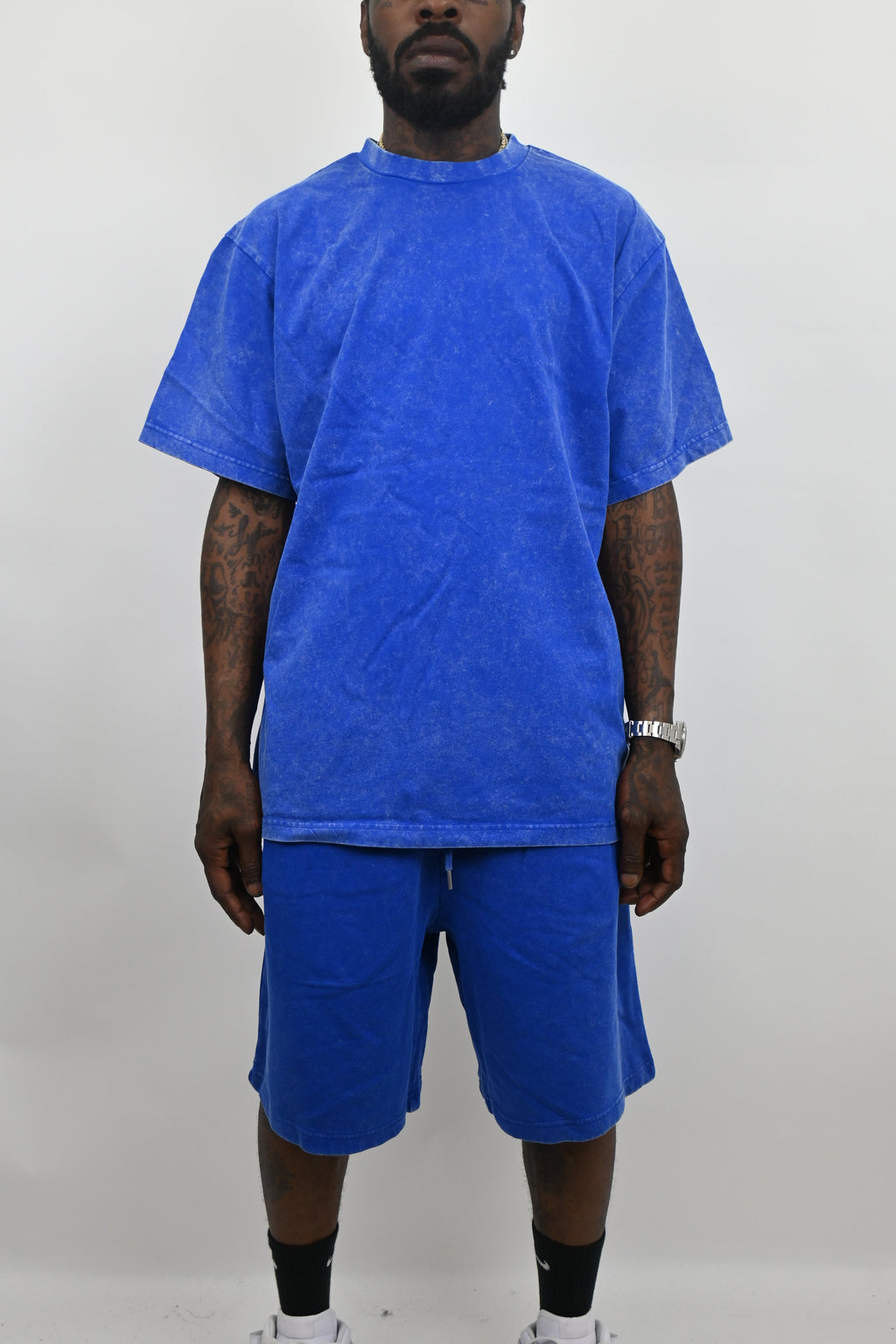 Stone washed denim set by ARMOR JEANS, featuring a stylish shirt and pants with a relaxed, faded finish.