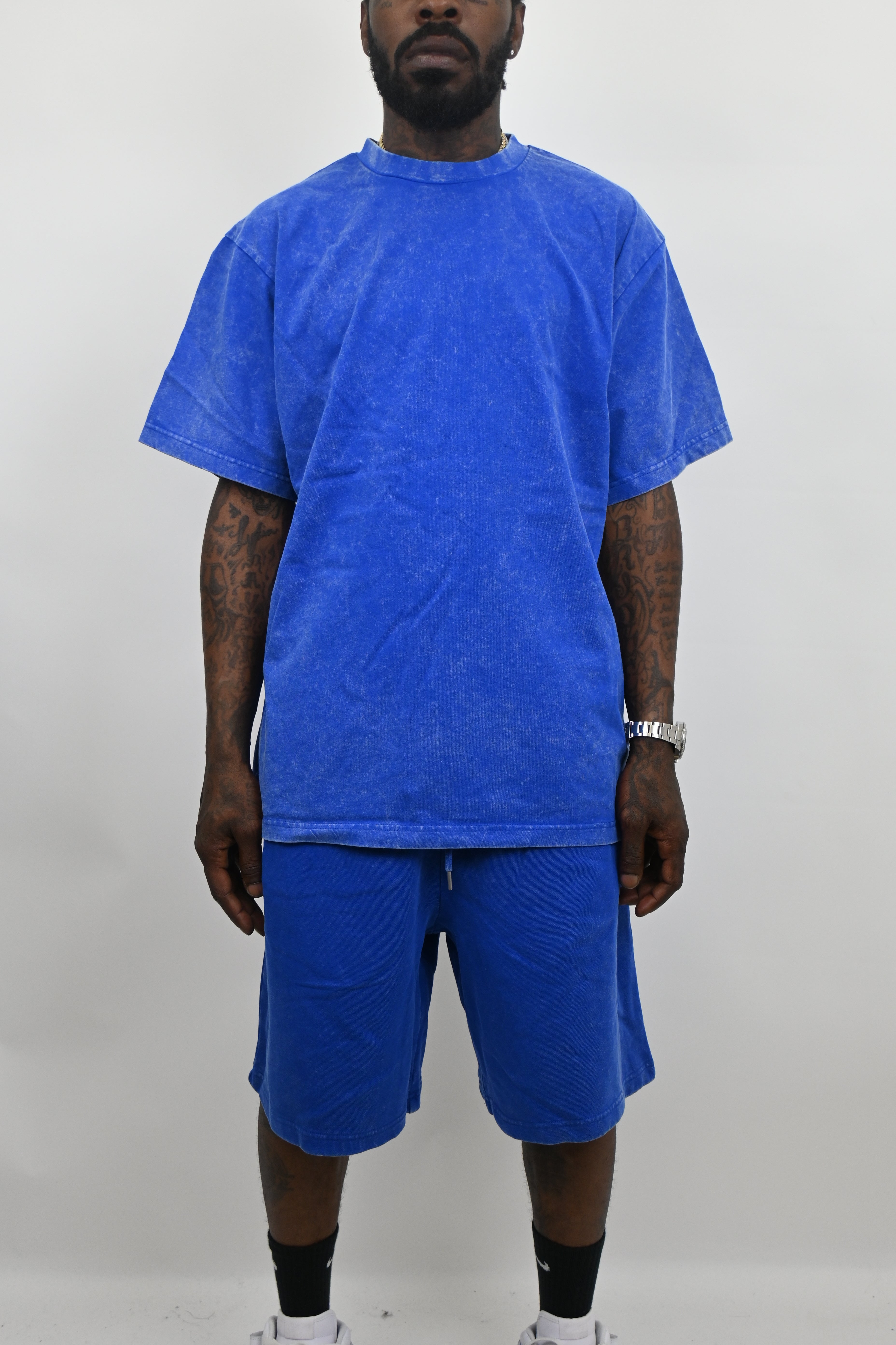 Stone washed denim set by ARMOR JEANS, featuring a stylish shirt and pants with a relaxed, faded finish.