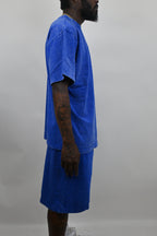 Stone washed denim sets by ARMOR JEANS featuring a stylish jacket and matching pants, displayed on a hanger.