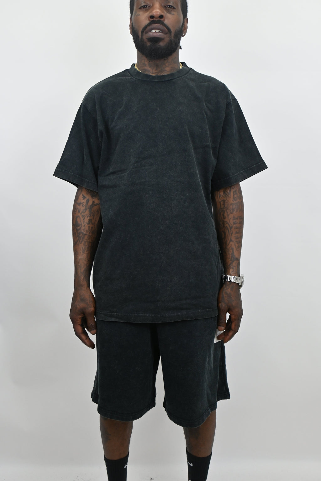 Stone washed denim sets by ARMOR JEANS, featuring casual tops and jeans with a relaxed, worn-in look.