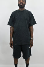 Stone washed denim sets by ARMOR JEANS, featuring casual tops and jeans with a relaxed, worn-in look.