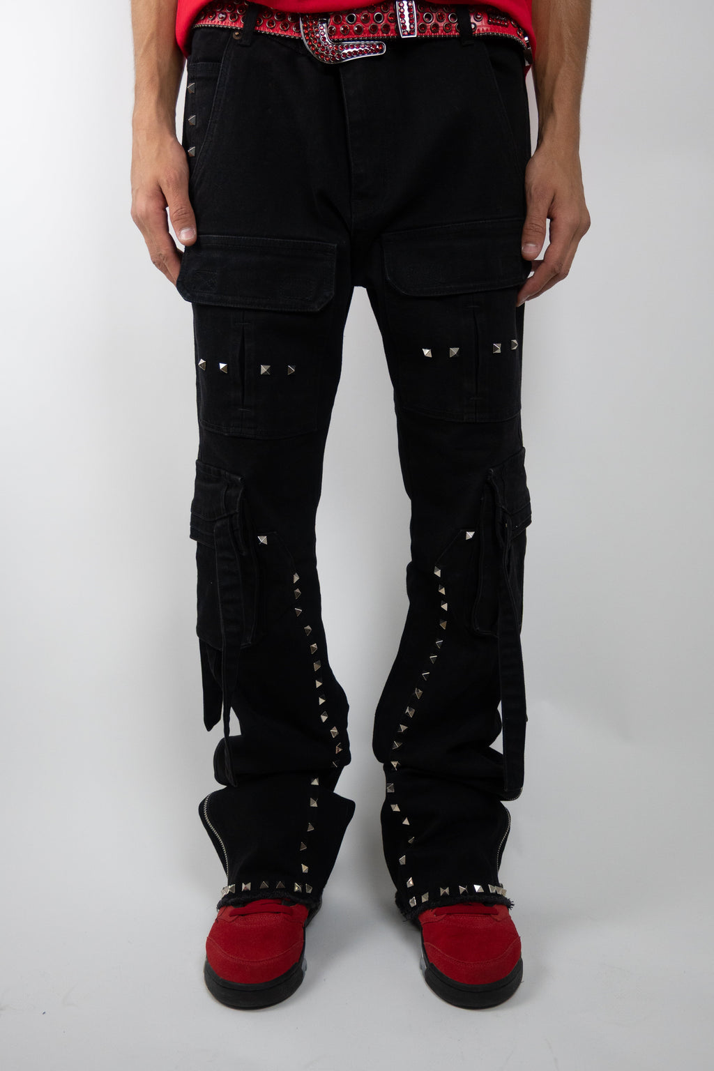 ARMOR JEANS RM206SK studded stacked cargo jeans, showcasing distressed denim with studded details and a relaxed fit.