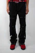ARMOR JEANS RM206SK studded stacked cargo jeans, showcasing distressed denim with studded details and a relaxed fit.