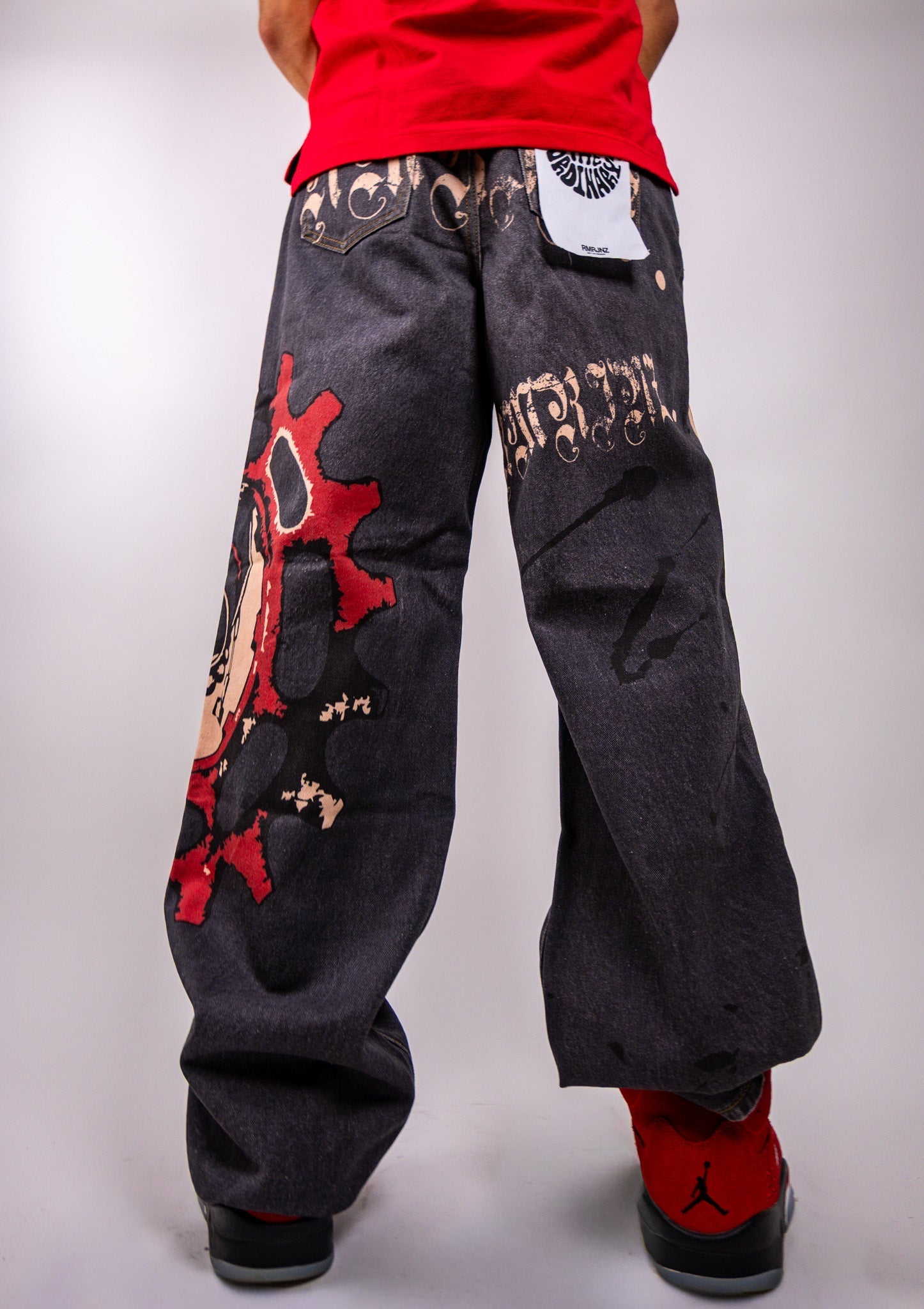 ARMOR JEANS RM200B graphic printed baggy jeans with bold patterns, relaxed fit, and denim fabric, shown in photo DSC_4336.jpg.
