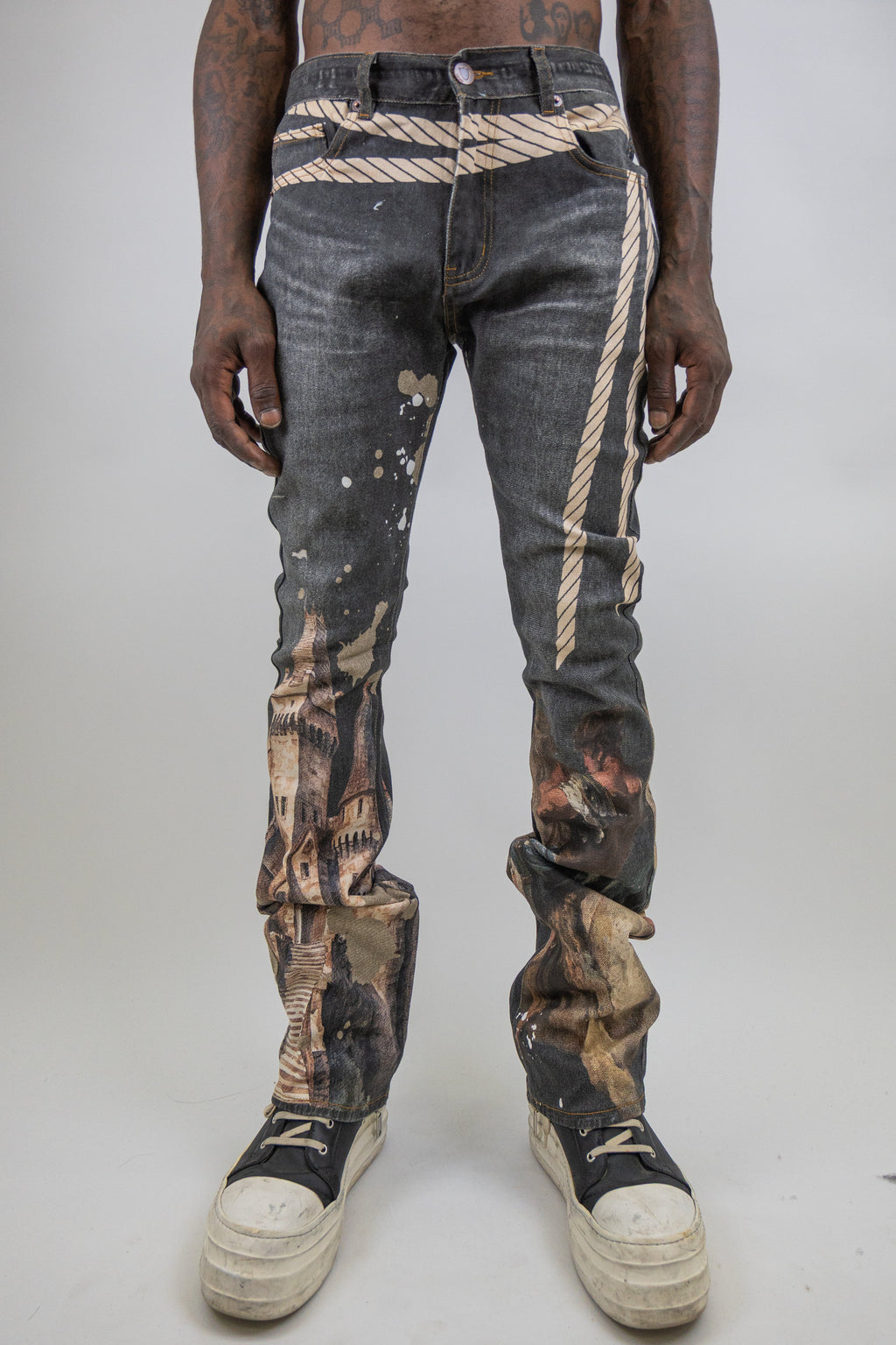 ARMOR JEANS RM203SK graphic printed stacked jeans featuring bold graphic designs and a stacked fit, shown in a detailed front view.