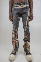 ARMOR JEANS RM203SK graphic printed stacked jeans featuring bold graphic designs and a stacked fit, shown in a detailed front view.
