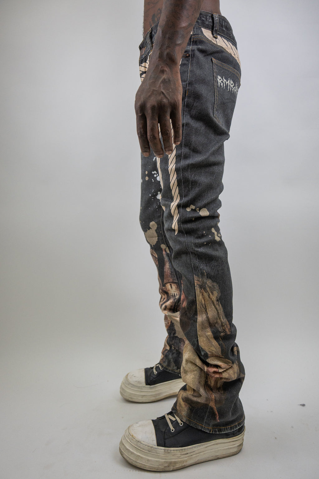 ARMOR JEANS RM203SK graphic printed stacked jeans showing a trendy design with colorful print and distressed details.