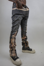 ARMOR JEANS RM203SK graphic printed stacked jeans with colorful designs, displayed on a hanger against a plain background.