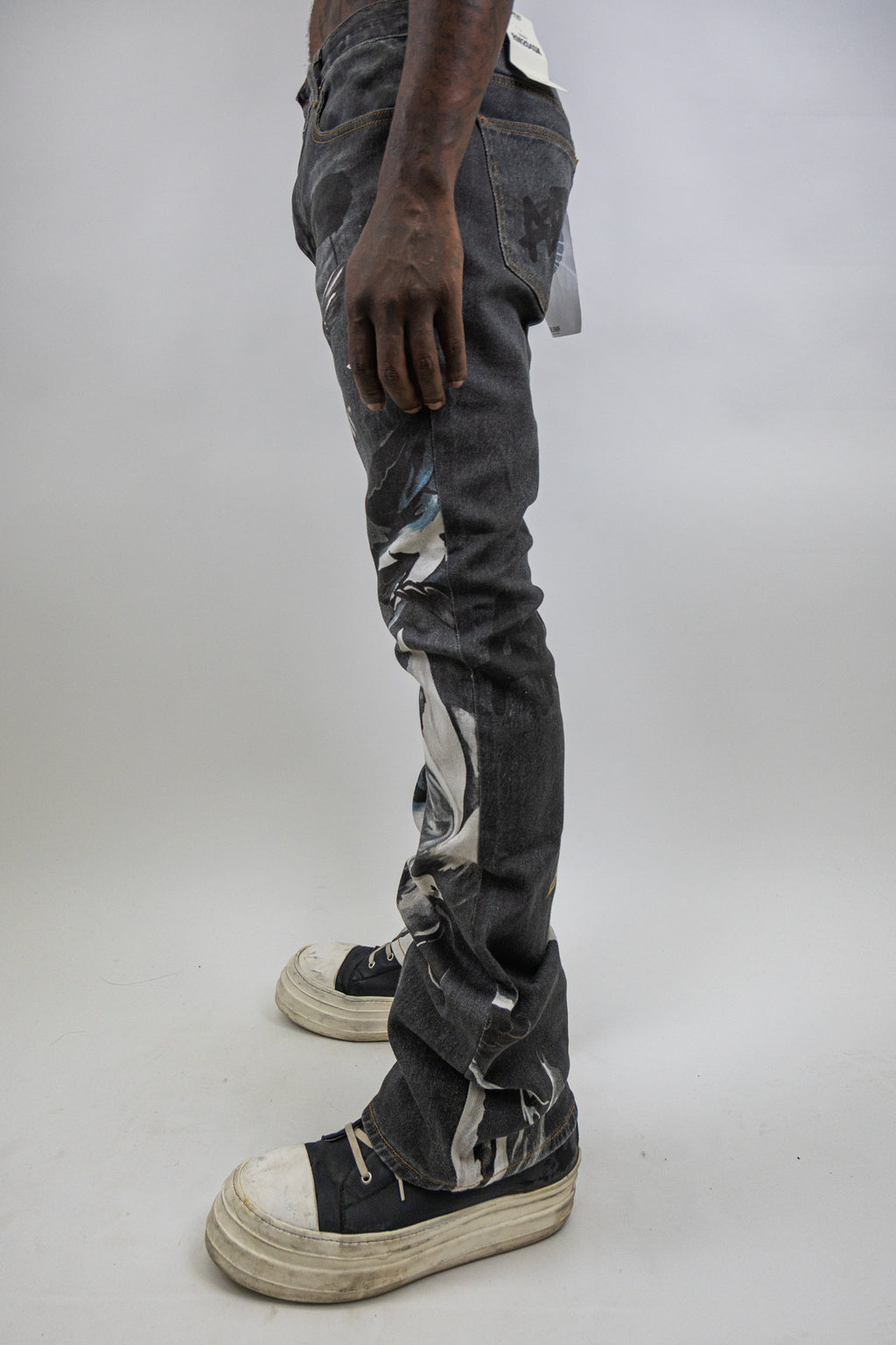 ARMOR JEANS RM204SK graphic printed stacked jeans featuring bold graphic designs and a stylish denim fit.